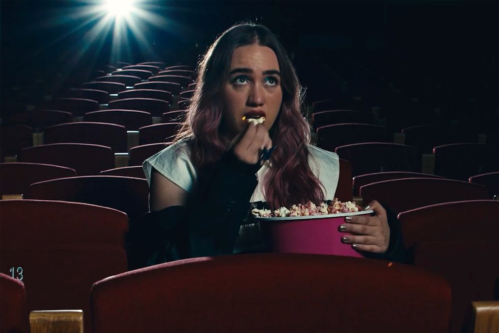 Ela Taubert Gets Over Heartbreak at a Movie Theater in Playful ‘Para Qué?’ Video